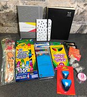 Full lot showing notebooks, colouring supplies and accessories