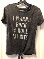 Front view showing text and tie-front hem