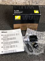 Box, manuals and bubble-wrapped components