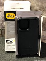 Front view of boxed OtterBox Defender case