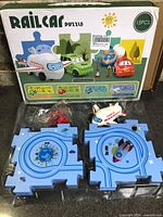 Box front showing Railcar Puzzle branding and 15pcs notation