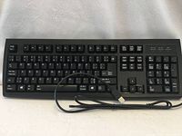 Top view of full keyboard with attached USB cable