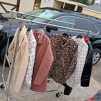 Full rack showing all six jackets and coats