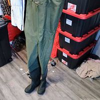 Full view of hanging chest waders