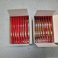 Open cartons showing two rows of packaged heel grips