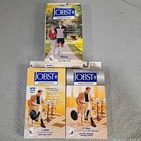Three boxed JOBST SupportWear socks, two Therapeutic, one Athletic