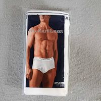 Front view of sealed Polo Ralph Lauren three-pack briefs
