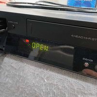 Front panel of Samsung DVD-VR357 showing DVD tray and display