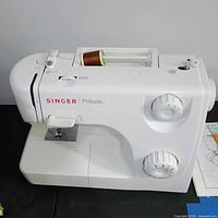 Front and top view of Singer Prelude 8280 sewing machine