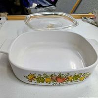 Casserole front showing vegetable graphic and lid