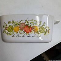 Side of pan showing Spice of Life pattern and text