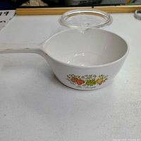 Side view of saucepan showing pattern and handle