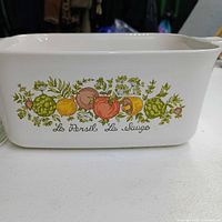 Side view showing Spice of Life vegetable motif and pattern text