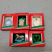Group shot of five boxed 1989 Hallmark miniature ornaments