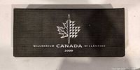 Outer cardboard sleeve marked Millennium Canada 2000