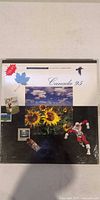 Front cover of sealed Canada 95 stamp collection book