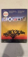 Front cover showing title, year 1992, retail price $31.95, artwork of tree silhouette, shrink wrap visible