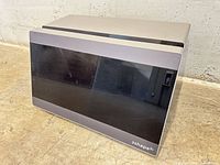 Front view of 3Shape D2000 scanner showing overall housing and front glass panel