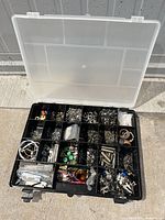 Closed organizer showing interior compartments and assortment