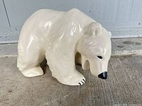 Front angle of white ceramic polar bear figurine