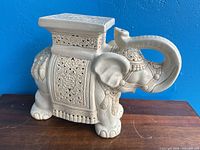 Full view of ceramic elephant plant stand
