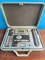 Open case showing full layout of prop equipment