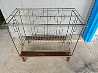 Front view of metal and wood vinyl record rack