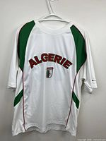 Full front view of Algeria jersey on hanger