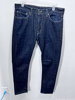 Full front view of Levi's dark indigo jeans