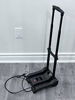 Full view of folded hand truck upright