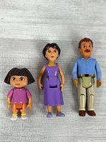 All three Dora family figures standing