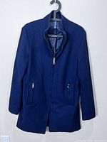 Front view of blue Zara Man overcoat on hanger