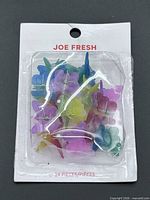 Front of sealed Joe Fresh pack showing multicolour butterfly clips
