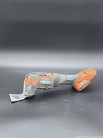 Full side view of Ridgid oscillating multi-tool without battery attached