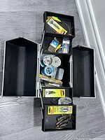 Overall view of open tackle case and contents