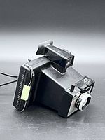 Front angle view of Polaroid Square Shooter 2 camera showing lens and controls