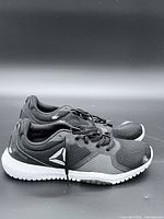 Left and right profile of the shoes showing overall design