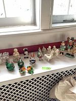 Full lot on windowsill with all figurines and shakers visible