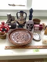 Group shot showing entire mixed lot with ruler for scale