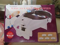 Retail box showing product image, model MG82000MC and 3 LED feature