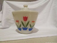 Front view showing tulip pattern and lid