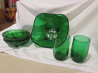 Group shot of all five green glass pieces