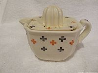 Pitcher with juicer lid assembled