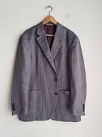 Front view of grey Canali sportcoat showing lapel, pockets, buttons