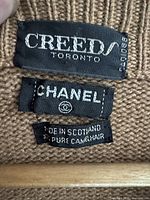 Label showing Creeds Toronto, Chanel, Made in Scotland 100% Pure Camelhair