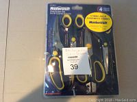 Front side photo showing the 4-piece shop scissors set packaged in plastic with Mastercraft branding.