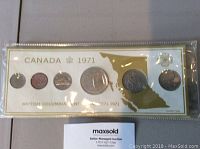 1971 Canadian British Columbia Centennial coin set in original packaging with gold map of BC and six various coins.