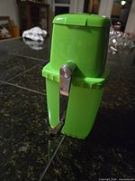 Profile showing full ice crusher with handle