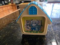 Front view showing house shape, illustration, roof detail