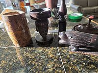 Group view of all five wooden tribal style items